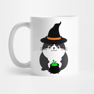 Funny fat cat is wearing a witch costume Mug